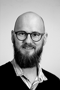 Svartvit ansiktsbild av Karl Ljunggren.