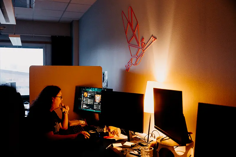 Game developer in a dark room